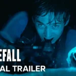 Austin Abrams en tenue de plongée dans le film Whalefall, au bord de la mer